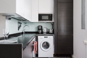 High-end appliances and thoughtful touches make this kitchen both beautiful and practical.