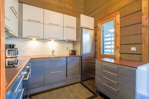 Fully equipped kitchen with a microwave, oven, and stove—everything you need to cook and dine in comfort