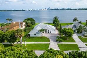 Breathtaking aerial view showcasing the property's waterfront location and stunning surroundings.