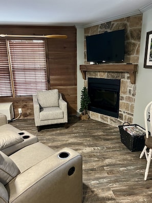Cozy fireplace with 42" Smart Tv