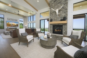 Comfortable seating nestled beside the gas fireplace for a relaxing retreat