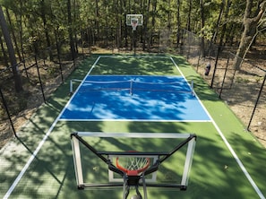 Sport Court with Basketball and Pickleball equipment