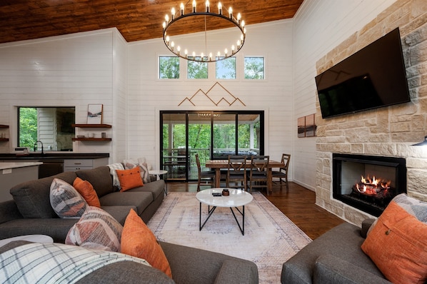 Unwind beneath vaulted ceilings and soak in the sunshine streaming through our airy, open-concept living space.