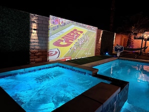 Relax and unwind in our spacious hot tub, big enough for 8 friends!