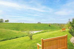 Kick back & relax with tranquil views of the nearby pond