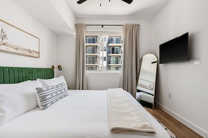 Bedroom 1: Experience ultimate relaxation. Our memory foam mattresses are paired with the privacy of an en-suite bathroom and the spaciousness of a walk-in closet.