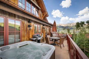 Private hot tub and patio with grill at the Veranda at Trails Edge
