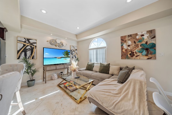 Cozy living room with a comfortable sofa—perfect for relaxing or entertaining.