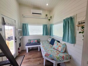 This light & bright tiny home will have you feeling those vacation vibes!