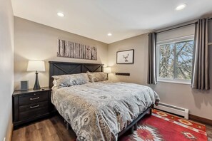 Bedroom 1: King bed, Roku TV, dresser