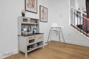 Tiny chefs welcome! Our place features a charming mini kitchen and a high chair, perfect for families with little ones.