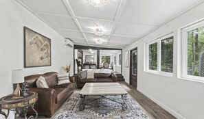 Stylish and massive gathering room is second living space- large TV and games
