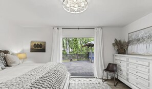 Gorgeous primary suite offers 40 inch TV, private bath-opens to hot tub,lounges
