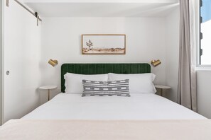 Drift off to dreamland on our memory foam mattress in this cozy bedroom with a smart TV for downtime.
