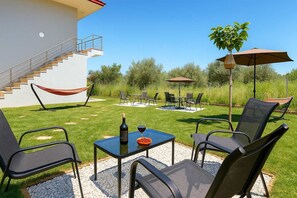 A green open space perfect for lounging, reading, or enjoying a sunny afternoon.