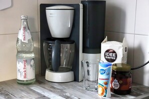 Kaffee und/oder Kaffeemaschine