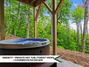 Soak in the private hot tub while taking in peaceful mountain views