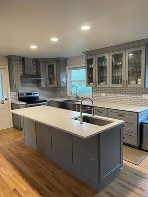 State of the art kitchen with two oven. 