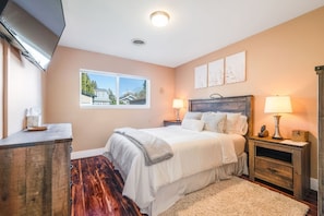 Welcome home to a spacious bedroom with luxury queen-sized