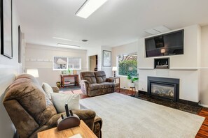 Comfy reclining couches make watching your favorite show an extra treat!  Please note that for safety reasons, the fireplace is not operational.