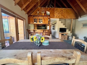 Dining table and breakfast bar with stools