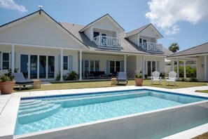 Cricket Beach house facade facing the pool and beach. Pool can be heated for an additional charge.