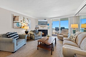 Relax in coastal elegance surrounded by natural light and ocean hues