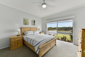 Large main bedroom with queen bed, ensuite and walk-through robe
