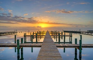 Take a sunset stroll on the boat dock.