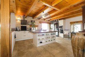 Fully equipped kitchen - Wine cellar - Toaster - Dishwasher - Coffeemaker - Kettle - Full set of cookware - Crockery and cutlery - Household linen provided.