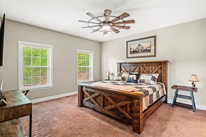 Spacious king bedroom with rustic charm and treetop views


