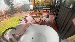 Porch and yard with outdoor bath