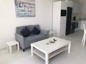 Open plan living room, dining room and kitchen