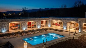 This exquisite 4-bedroom villa is designed to offer families and groups an unforgettable getaway, blending luxury with the tranquility of nature