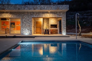 Step outside to discover your very own private retreat: a heated swimming pool (9 m x 5m) equipped with an electrolysis filtration system