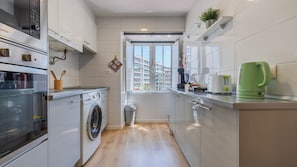 Fully equipped kitchen with a functional layout for longer stays. #Portugal #PT #Lisbon #kitchenlife #midtermrental