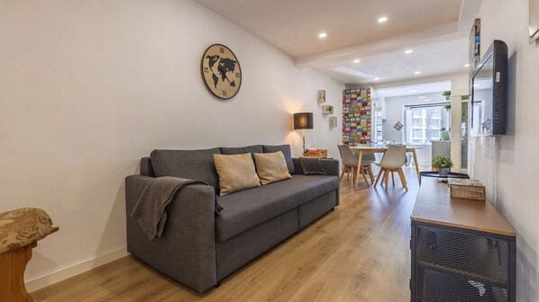 Cozy living room with a playful design and modern touches. #Portugal #PT #Lisbon #midtermrental #apartmentliving