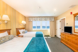 Sink into plush comfort after a day by the water, surrounded by soft tones and seaside serenity.