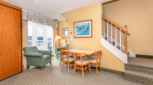 Gather in a bright, open space where coastal charm meets relaxed comfort—perfect for unwinding together.