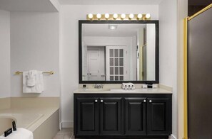 Clean lines and quiet tones invite a soothing reset after a day spent soaking up the salt air.