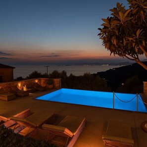 Night View of the Villa and Pool – Peaceful Evening Ambience