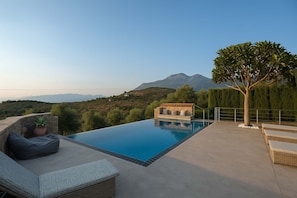 Poolside Lounge – Views Toward Sea and Sunset