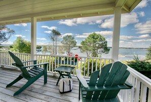 Relax beneath the shade of the porch as sea breezes and sweeping views invite you to slow down and savor the moment.