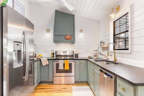  Embrace your inner chef in this stylishly appointed kitchen with modern appliances and all of the amenities you will love.