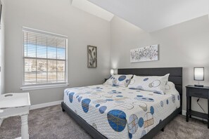 Drift off into sweet dreams in the luxurious master bedroom.