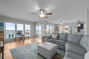 Living room and dining area with ocean views!