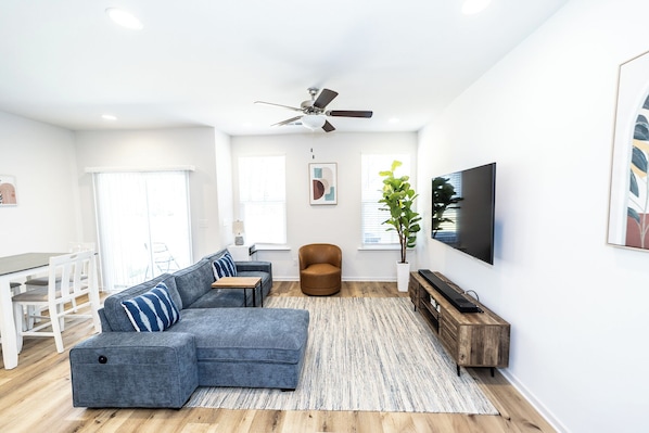 Relax in style in this open and airy living room