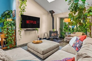 Open concept main level with tons of natural light from the expansive skylights!
