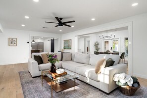 View of living area/dining/entry to kitchen