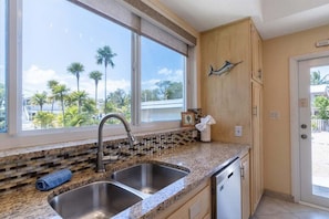 Bright, modern kitchen with coastal charm.